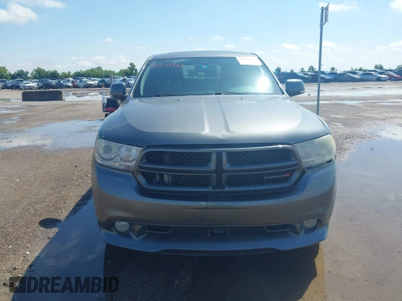 2013 Dodge Durango R/T z VIN 1C4SDHCT7DC564802, wystawiony jako IAAI lot #42348957 z przebiegiem 178 354 mil mil oraz . Historia ofert i sprzedaży dostępna na DreamBid. Obrazek 12.