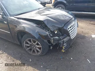 2009 Chrysler 300 Limited with VIN 2C3KA33V59H570460, listed as a IAAI auction lot 42017573 with 130,600 mi miles. Bid and sale history available at carsss.com. Image 6.