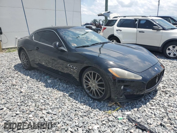 2011 Maserati GranTurismo S with VIN ZAM45KLA9B0059436, listed as a Copart auction lot 55851475 with Not provided miles and Clean title. Bid and sale history available at DreamBid. Image 4.