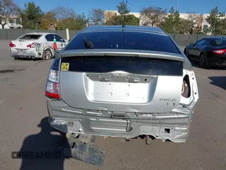 2005 Toyota Prius z VIN JTDKB20UX53080527, wystawiony jako IAAI lot #41831153 z przebiegiem 256 327 mil mil oraz . Historia ofert i sprzedaży dostępna na DreamBid. Obrazek 6.