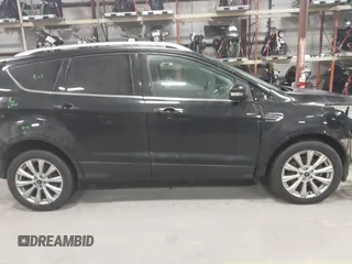 2017 Ford Escape Titanium with VIN 1FMCU9J9XHUB51401, listed as a IAAI auction lot 41025642 with 77,908 mi miles. Bid and sale history available at carsss.com. Image 13.
