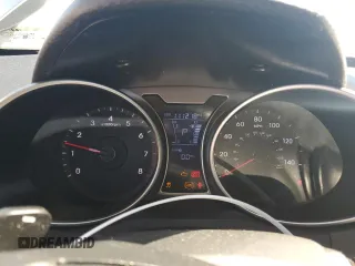 2013 Hyundai Veloster w/Red Int with VIN KMHTC6AD2DU132230, listed as a Copart auction lot 60237225 with 111,218 mi miles and Salvage title. Bid and sale history available at DreamBid. Image 9.