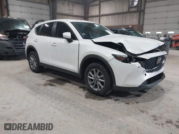 2023 Mazda CX-5 2.5 S with VIN JM3KFBAMXP0153362, listed as a IAAI auction lot 41875188 with 57,648 mi miles. Bid and sale history available at carsss.com. Image 1.