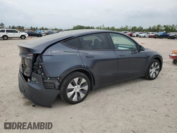 2022 Tesla Model Y Long Range with VIN 7SAYGDEE1NF315198, listed as a Copart auction lot 50399005 with 33,357 mi miles and Salvage Title. Bid and sale history available at DreamBid. Image 3.