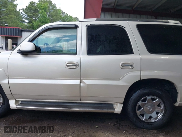2003 Cadillac Escalade z VIN 1GYEK63NX3R241388, wystawiony jako IAAI lot #42227896 z przebiegiem 154 415 mil mil oraz . Historia ofert i sprzedaży dostępna na DreamBid. Obrazek 14.