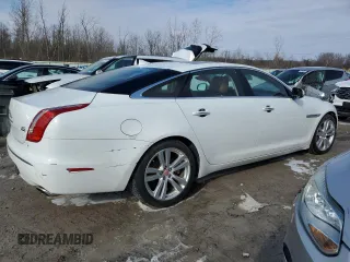 2015 Jaguar XJ Portfolio z VIN SAJWJ2GD5F8V77355, wystawiony jako Copart lot #47214835 z przebiegiem 73 202 mil mil oraz Szkoda całkowita • Salvage title. Historia ofert i sprzedaży dostępna na DreamBid. Obrazek 3.