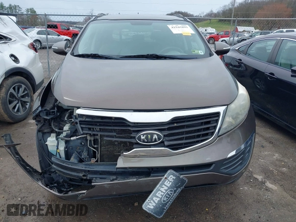 2011 Kia Sportage LX with VIN KNDPB3A20B7024111, listed as a IAAI auction lot 41945892 with 139,605 mi miles and . Bid and sale history available at carsss.com. Image 6.