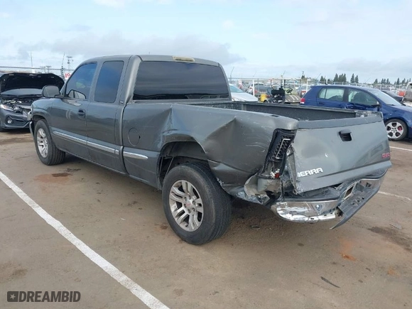 2002 GMC Sierra 1500 SLE with VIN 2GTEC19V121231109, listed as a IAAI auction lot 41906878 with 237,729 mi miles. Bid and sale history available at carsss.com. Image 3.