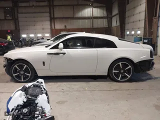 2014 Rolls-Royce Wraith with VIN SCA665C59EUX84389, listed as a IAAI auction lot 41413368 with 57,951 mi miles. Bid and sale history available at carsss.com. Image 15.