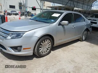 2012 Ford Fusion Hybrid с VIN 3FADP0L36CR426322, выставлен на аукционе IAAI как лот 42592635 с пробегом 151 941 миль миль и . История ставок и продаж доступна на DreamBid. Изображение 18.