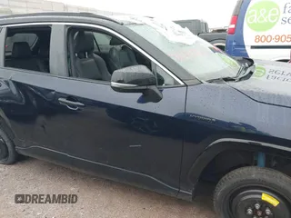 2021 Toyota RAV4 Hybrid XSE with VIN 2T3E6RFV5MW002856, listed as a IAAI auction lot 42387921 with Not provided miles and . Bid and sale history available at DreamBid. Image 12.
