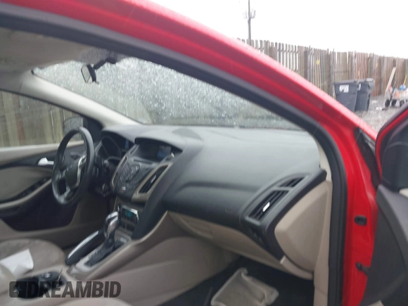 2012 Ford Focus SEL with VIN 1FAHP3H25CL162575, listed as a IAAI auction lot 42018674 with 237,745 mi miles. Bid and sale history available at carsss.com. Image 5.