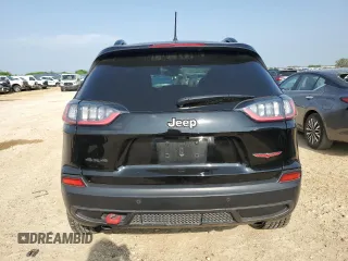 2022 Jeep Cherokee Trailhawk с VIN 1C4PJMBX8ND502686, выставлен на аукционе Copart как лот 51180645 с пробегом 62 865 миль миль и Списание • Salvage title. История ставок и продаж доступна на DreamBid. Изображение 6.