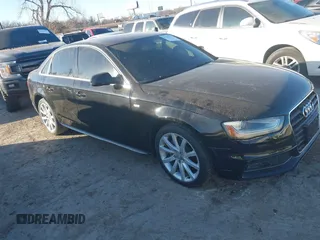 2014 Audi A4 Premium with VIN WAUAFAFL2EN027265, listed as a IAAI auction lot 41394334 with 130,582 mi miles. Bid and sale history available at carsss.com. Image 1.