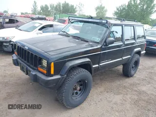2000 Jeep Cherokee z VIN 1J4FF48S2YL190863, wystawiony jako IAAI lot #42820115 z przebiegiem 133 296 mil mil oraz . Historia ofert i sprzedaży dostępna na DreamBid. Obrazek 2.