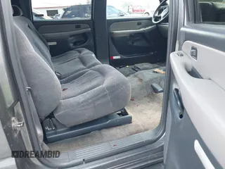 2002 Chevrolet Suburban LS z VIN 3GNEC16Z62G255198, wystawiony jako IAAI lot #42312829 z przebiegiem 192 459 mil mil oraz . Historia ofert i sprzedaży dostępna na DreamBid. Obrazek 8.