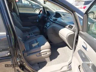 2014 Honda Odyssey EX-L with VIN 5FNRL5H61EB024188, listed as a IAAI auction lot 42238505 with 180,163 mi miles and . Bid and sale history available at DreamBid. Image 5.