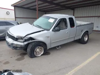 2000 Ford F-150 XL with VIN 1FTRX18L9YKA05396, listed as a IAAI auction lot 41637310 with 234,555 mi miles. Bid and sale history available at carsss.com. Image 17.