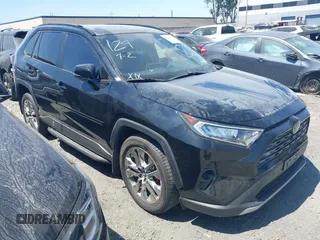 2019 Toyota RAV4 Limited z VIN JTMY1RFV6KD504989, wystawiony jako IAAI lot #42599164 z przebiegiem 103 507 mil mil oraz . Historia ofert i sprzedaży dostępna na DreamBid. Obrazek 1.