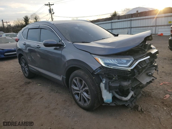 2021 Honda CR-V Touring with VIN 2HKRW2H94MH641388, listed as a Copart auction lot 87692045 with 56,145 mi miles and Salvage Title. Bid and sale history available at carsss.com. Image 4.