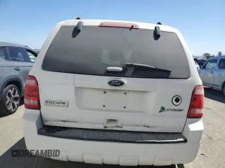 2011 Ford Escape Hybrid z VIN 1FMCU5K39BKA88197, wystawiony jako Copart lot #50896195 z przebiegiem 186 007 mil mil oraz Czysty tytuł • Clean title. Historia ofert i sprzedaży dostępna na DreamBid. Obrazek 6.