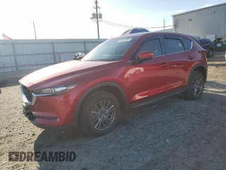 2021 Mazda CX-5 Touring with VIN JM3KFACM9M1326706, listed as a Copart auction lot 52357985 with 36,071 mi miles and Salvage Title. Bid and sale history available at carsss.com. Image 1.