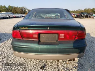 1997 Buick Regal GS with VIN 2G4WF5211V1479225, listed as a Copart auction lot 75203384 with 65,859 mi miles and Salvage Title. Bid and sale history available at carsss.com. Image 6.