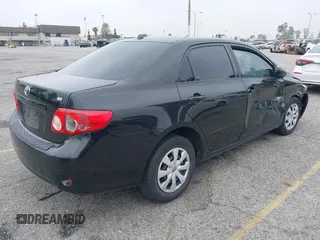 2010 Toyota Corolla with VIN 1NXBU4EE1AZ285449, listed as a IAAI auction lot 42040668 with 121,404 mi miles and . Bid and sale history available at carsss.com. Image 4.
