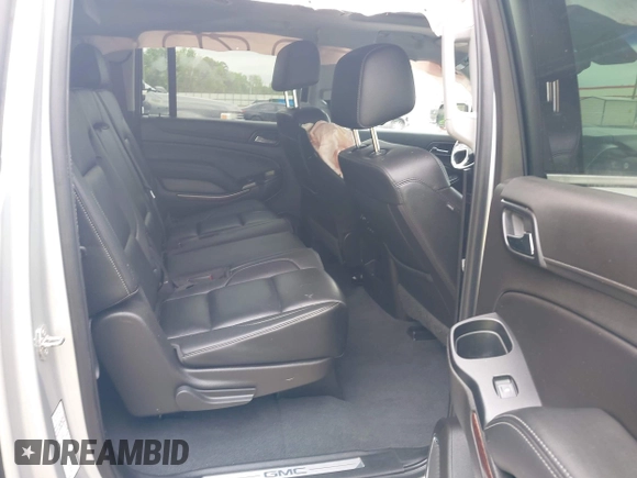 2019 GMC Yukon XL SLT z VIN 1GKS1GKC0KR242408, wystawiony jako IAAI lot #42144783 z przebiegiem Nie podano mil oraz . Historia ofert i sprzedaży dostępna na DreamBid. Obrazek 8.