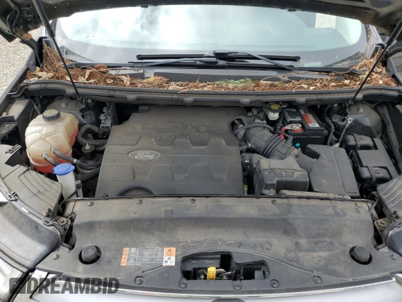 2015 Ford Edge Titanium z VIN 2FMTK4K84FBB09582, wystawiony jako Copart lot #55801915 z przebiegiem 72 533 mil mil oraz Szkoda całkowita • Salvage title. Historia ofert i sprzedaży dostępna na DreamBid. Obrazek 12.