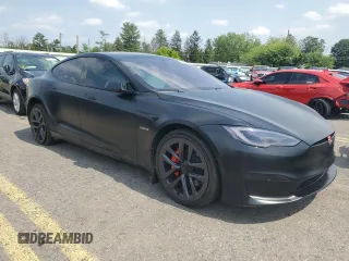 2022 Tesla Model S Plaid with VIN 5YJSA1E66NF460913, listed as a Copart auction lot 60534665 with 47,595 mi miles and Salvage title. Bid and sale history available at DreamBid. Image 4.