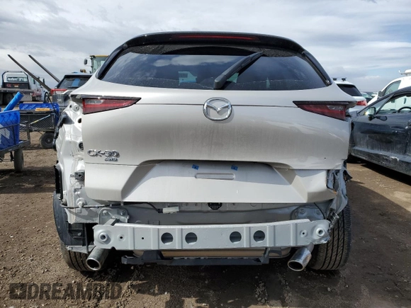 2022 Mazda CX-30 S Premium with VIN 3MVDMBDL4NM447276, listed as a Copart auction lot 47527985 with 4,577 mi miles and Salvage Title. Bid and sale history available at carsss.com. Image 6.