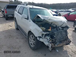 2010 Mercury Mariner Premier with VIN 4M2CN8HG3AKJ15125, listed as a IAAI auction lot 41440858 with 1 mi miles. Bid and sale history available at carsss.com. Image 1.