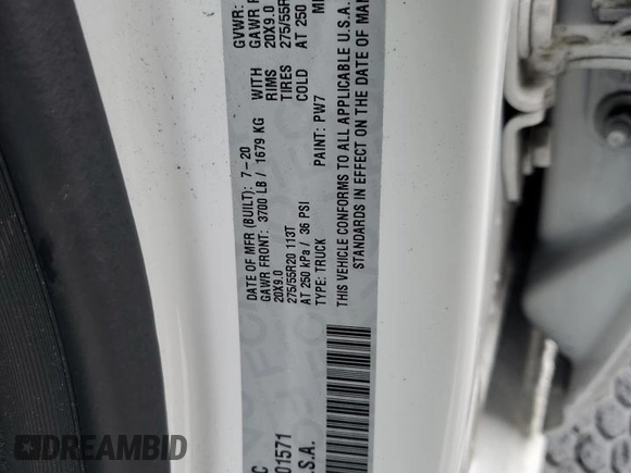 2020 Ram 1500 with VIN 1C6RREKG4LN401571, listed as a Copart auction lot 43620245 with 99,979 mi miles and Salvage title. Bid and sale history available at DreamBid. Image 12.
