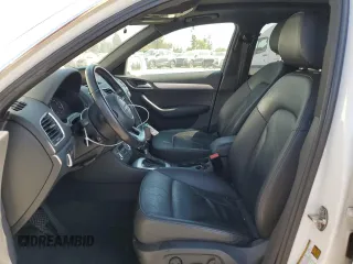 2015 Audi Q3 Premium Plus with VIN WA1BFCFS0FR001987, listed as a Copart auction lot 72962684 with 104,432 mi miles and Salvage title. Bid and sale history available at DreamBid. Image 7.