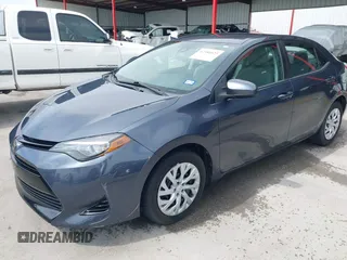 2018 Toyota Corolla L with VIN 5YFBURHE8JP770696, listed as a IAAI auction lot 42386025 with 63,224 mi miles and . Bid and sale history available at DreamBid. Image 19.