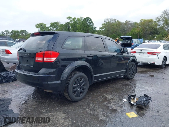 2014 Dodge Journey American Value Pkg with VIN 3C4PDCAB9ET170601, listed as a IAAI auction lot 41197807 with Not Provided miles. Bid and sale history available at carsss.com. Image 4.