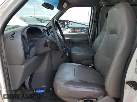 1999 Ford Econoline Cargo with VIN 1FTRE1429XHA29986, listed as a Copart auction lot 70331004 with 312,901 mi miles and Non Repairable. Bid and sale history available at carsss.com. Image 7.