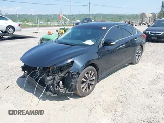2016 Nissan Altima SR with VIN 1N4AL3AP7GC135399, listed as a IAAI auction lot 42412618 with 112,067 mi miles and . Bid and sale history available at DreamBid. Image 2.