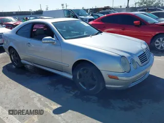 2002 Mercedes-Benz CLK 320/430 with VIN WDBLJ70G92T127992, listed as a IAAI auction lot 41862108 with 196,205 mi miles and . Bid and sale history available at DreamBid. Image 1.