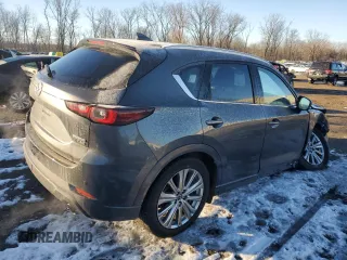 2023 Mazda CX-5 Signature with VIN JM3KFBXY8P0258573, listed as a Copart auction lot 42615075 with 18,916 mi miles and Salvage Title. Bid and sale history available at carsss.com. Image 3.