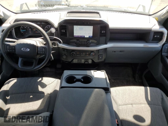2023 Ford F-150 XL with VIN 1FTFW1E89PKD98613, listed as a Copart auction lot 61860785 with 25,568 mi miles and Salvage title. Bid and sale history available at DreamBid. Image 8.