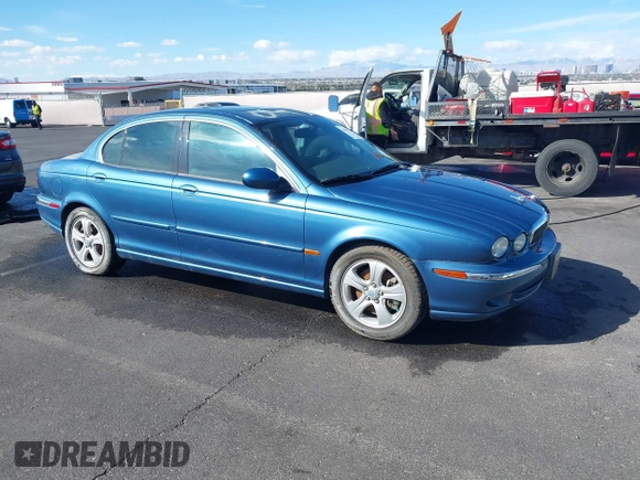 2002 Jaguar X-Type with VIN SAJEA51C42WC11103, listed as a IAAI auction lot 41699366 with 106,418 mi miles and . Bid and sale history available at DreamBid. Image 1.