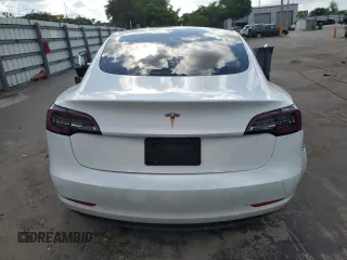 2023 Tesla Model 3 z VIN 5YJ3E1EA7PF576489, wystawiony jako Copart lot #61039505 z przebiegiem 35 243 mil mil oraz Nie do naprawy • Non repairable. Historia ofert i sprzedaży dostępna na DreamBid. Obrazek 6.