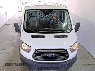 2019 Ford Transit z VIN 1FTYE1YM5KKB87003, wystawiony jako IAAI lot #42610488 z przebiegiem 106 642 mil mil oraz . Historia ofert i sprzedaży dostępna na DreamBid. Obrazek 16.