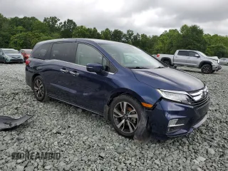 2018 Honda Odyssey Elite z VIN 5FNRL6H9XJB039802, wystawiony jako Copart lot #57116345 z przebiegiem 107 939 mil mil oraz Szkody całkowita. Historia ofert i sprzedaży dostępna na DreamBid. Obrazek 4.