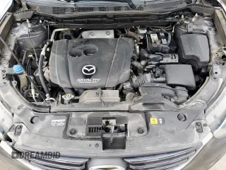 2016 Mazda CX-5 Touring z VIN JM3KE2CY7G0654292, wystawiony jako Copart lot #53433745 z przebiegiem 168 273 mil mil oraz Szkoda całkowita • Salvage title. Historia ofert i sprzedaży dostępna na DreamBid. Obrazek 12.