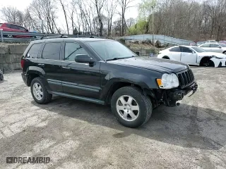 2009 Jeep Grand Cherokee Laredo with VIN 1J8GR48K79C537213, listed as a Copart auction lot 51222395 with 148,838 mi miles and Salvage Title. Bid and sale history available at carsss.com. Image 11.