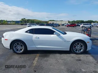2015 Chevrolet Camaro LS z VIN 2G1FB1E32F9140247, wystawiony jako IAAI lot #42240205 z przebiegiem 196 142 mil mil oraz . Historia ofert i sprzedaży dostępna na DreamBid. Obrazek 13.