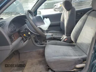 1997 Nissan Altima XE z VIN 1N4BU31D2VC138876, wystawiony jako Copart lot #53892515 z przebiegiem 155 286 mil mil oraz Szkoda całkowita • Salvage title. Historia ofert i sprzedaży dostępna na DreamBid. Obrazek 7.